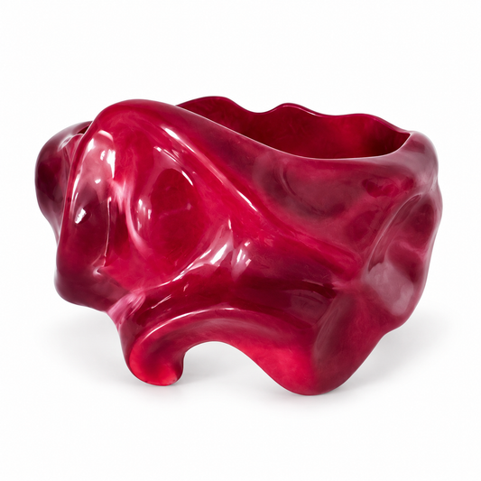 Glossy burgundy sculptural bangle bracelet with flowing wavy curves
